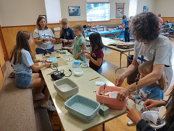 Summer Suomi School kitchen activity.